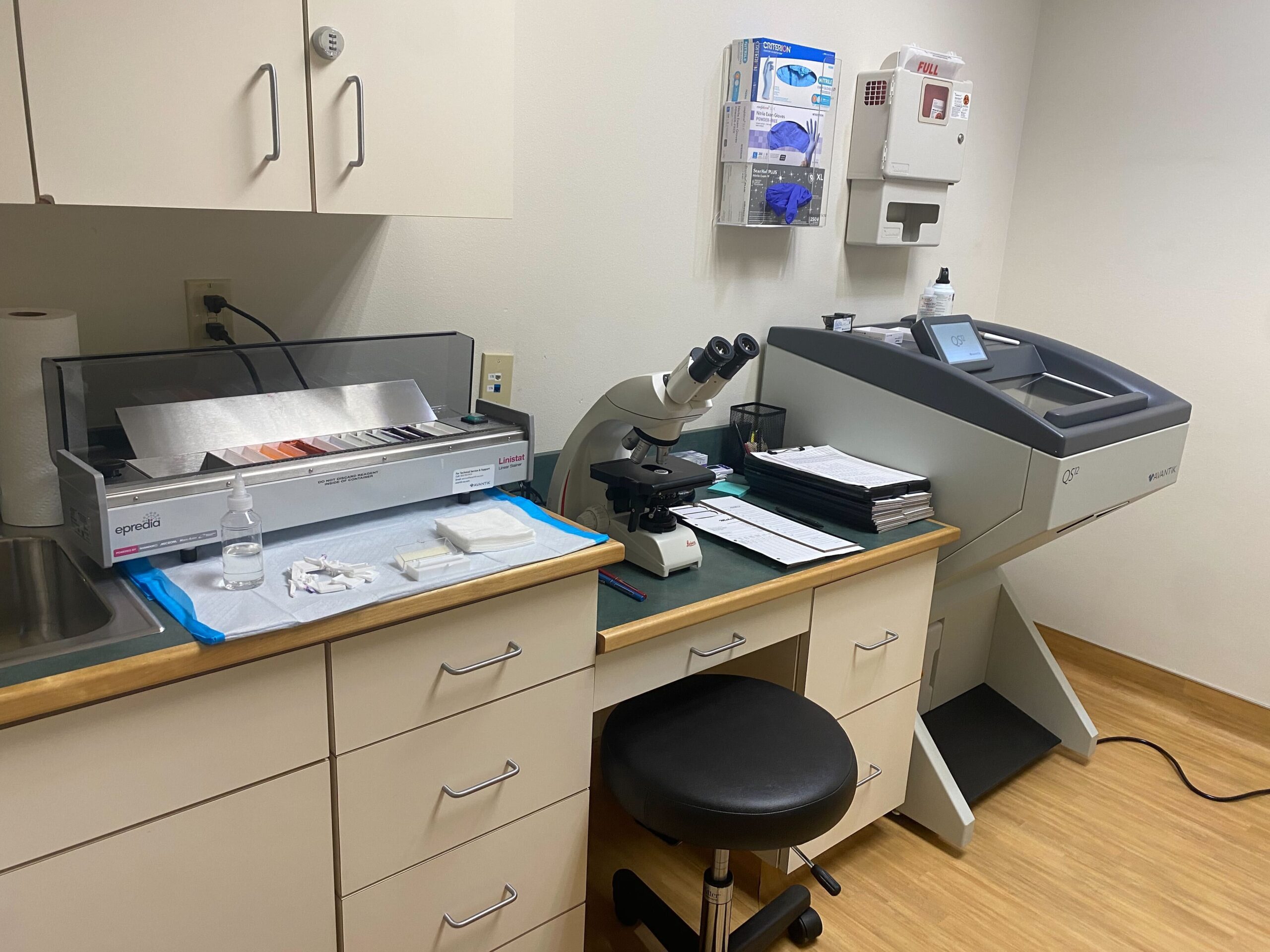 MohsPros lab set up. Including cryostat, auto stainer, and microscrope area for reading slides.